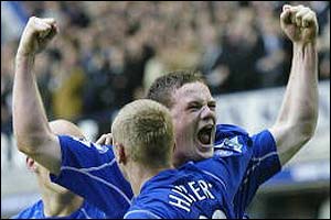 Wayne Rooney celebrates his goal against Aston Villa