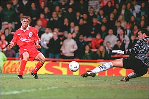 Michael Owen scores his first ever league goal past Wimbledon's Neil Sullivan in May 1997