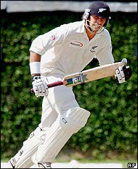 New Zealand captain Stephen Fleming works the ball through the on-side