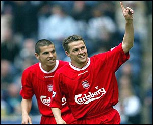 Michael Owen celebrates with Milan Baros after scoring his second goal against West Brom on 26 May 2003