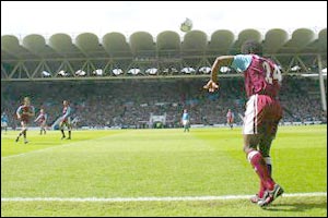 West Ham left-back Rufus Brevett takes a throw-in