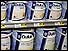Cans of Dulux paint made by ICI