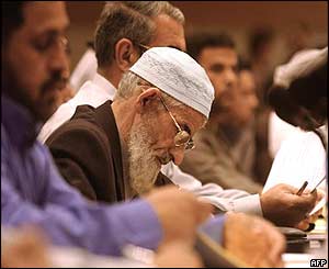 Delegates take notes during the conference