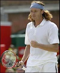 Norman's power makes life tough for Hewitt