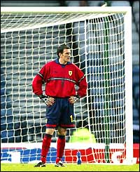 Scotland keeper Paul Gallacher looks disconsolate after his mistake allows Mario Hass to double Austria's lead