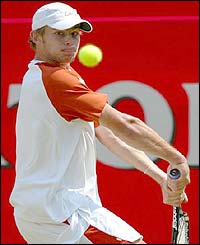 Roddick prepares to play a backhand