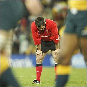 A Welsh player hangs his head after the loss to Australia