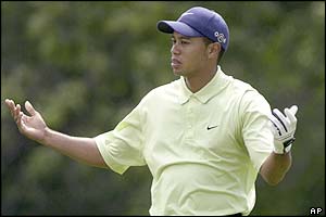 Tiger Woods is upset on the first hole 