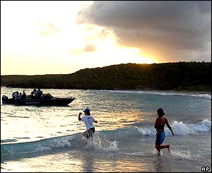 Protesters on beach once occupied by US Navy