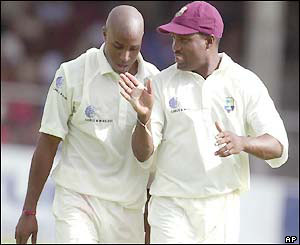Windies captain Brian Lara (right) talks to bowler Tino Best