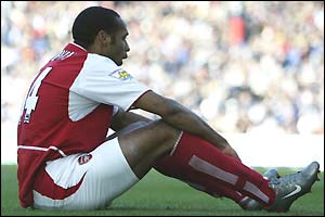 Thierry Henry sits dejected after a 2-0 defeat to Blackburn