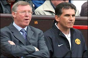 Sir Alex Ferguson and his assistant Carlos Queiroz look on in silence as Charlton equalise