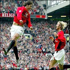 Ruud van Nistelrooy celebrates his second goal with David Beckham