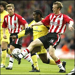 Jay Jay Okocha battles with Brett Ormorod 