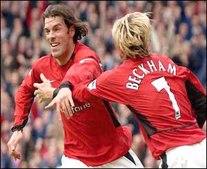 Ruud van Nistelrooy celebrates with David Beckham against Charlton