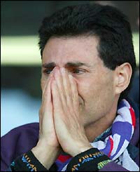 Exeter chairman Uri Geller looks on in despair