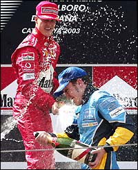 Michael Schumacher celebrates his victory in the Spanish Grand Prix 