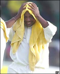 West Indies captain Brian Lara wipes his head during a drinks break