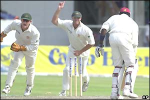 Adam Gilchrist appeals for a stumping against Brian Lara, the West Indies captain