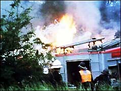 The wrecked Trident jet bursts into flames at the crash scene
