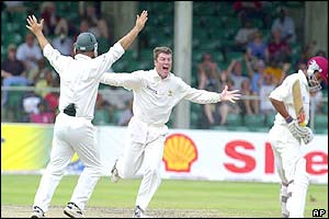 Australia's Stuart MacGill celebrates a wicket