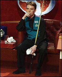 Ken Doherty sits and watches as Williams wraps up victory