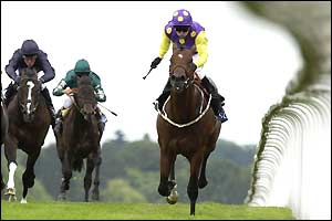 Kevin Darley on Russian Valour (right) streaks away to win The Norfolk Stakes