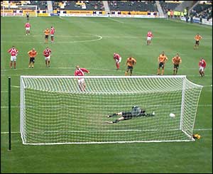 Wrexham's Andy Morrell scores from the spot against Hull City