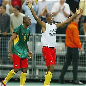 Eto'o celebrates his goal with team-mates and fans