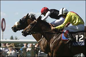 Pat Smullen rides In Time's Eye into first place in the Wolferton Rated Stakes ahead of Persian Lightning