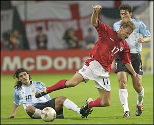 Ariel Ortega brings down Sheringham in the crucial World Cup match against Argentina