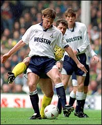 Teddy Sheringham attacks the Norwich defence in April 1993