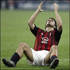 AC Milan midfielder Gennaro Gattuso shows his frustration after missing an opportunity