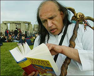 Reveller reading Harry Potter