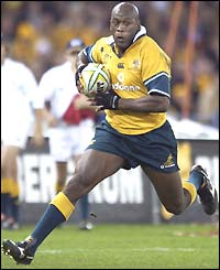 Wendell Sailor races away to score Australia's only try of the match two minutes from the end