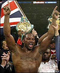 Lenox Lewis celebrates a far from convincing win