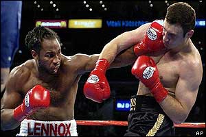 Lewis fights back with some good power shots