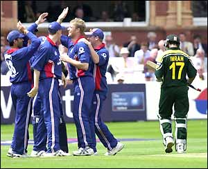 Nazir is out for a stubborn eight runs from 24 balls and Andrew Flintoff accepts the plaudits of his team-mates