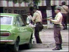 Police firing on demonstrators