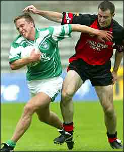 Kieran Gallagher looks a little worried at wind going to happy to him against Burns