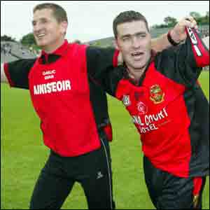 Down manager Paddy O'Rourke looking pleased alongsdie James mcCartan