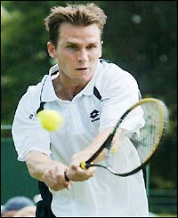 Rainer Schuettle beats Michel Kratochvil 6-3 6-4 6-7 (4-7) 7-5