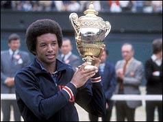 Arthur Ashe with the Wimbledon Trophy