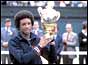 Arthur Ashe with the Wimbledon Trophy