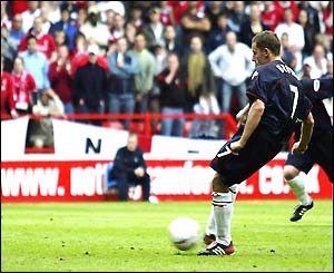Michael Brown slots home a second-half penalty