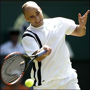 Andre Agassi goes through to the second round in four sets