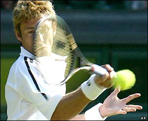 Juan Carlos Ferrero hits a forehand