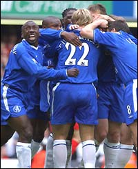 Chelsea celebrate their first goal against Liverpool