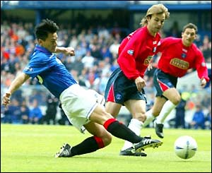 Michael Mols tucks home Rangers' opening goal on six minutes