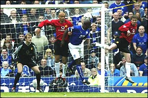 Kevin Campbell steals in at the near post after eight minutes to boost Everton's chances of a Uefa Cup place 